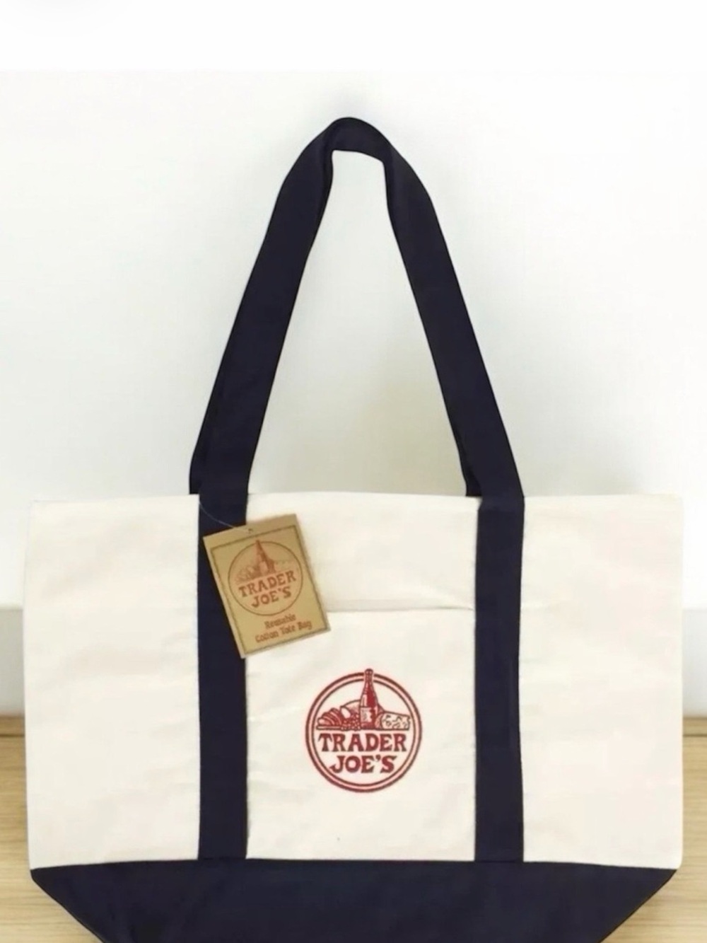 Trader Joe’s Cream Canvas Tote with Navy Trim, embroidered red logo